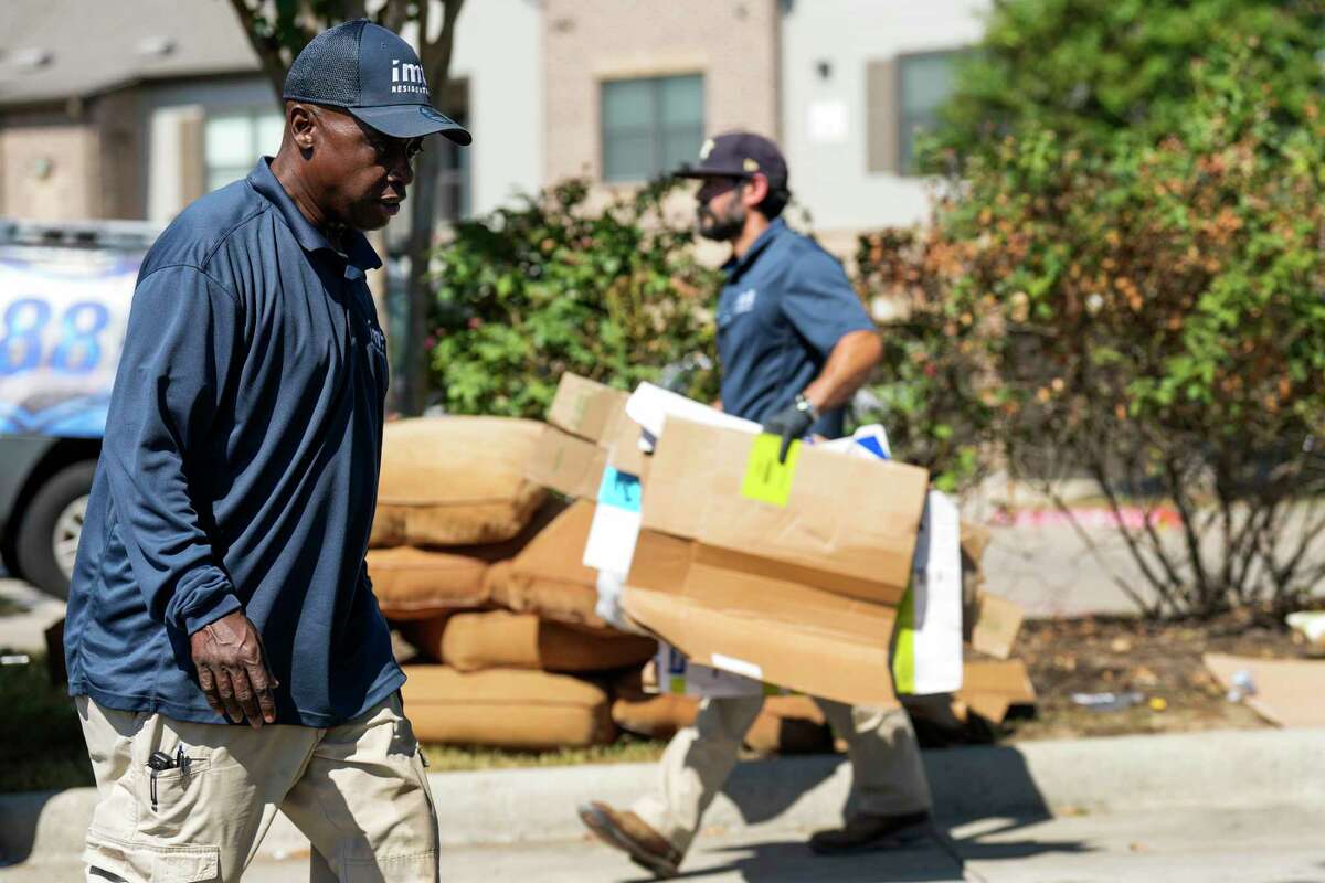 Keith Carter, 59, working at IMT Cinco Ranch apartments Thursday, Oct. 6, 2022 in Katy. He found the job through Shelters to Shutters, a nonprofit that works to move people out of homelessness by connecting them with jobs in the real estate industry.
