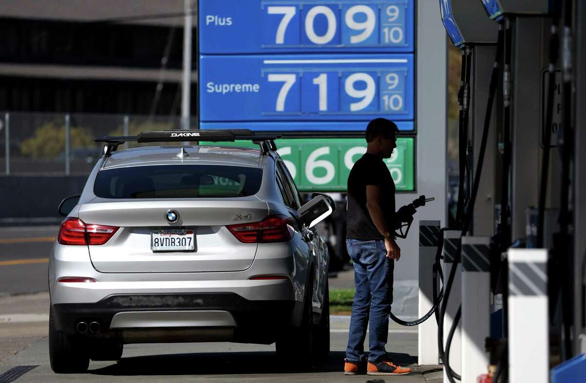 California’s gas prices will decrease by $1 a gallon, experts say. Gas prices over $7 a gallon are displayed at a Chevron gas station in Mill Valley, Calif., on Oct. 3.