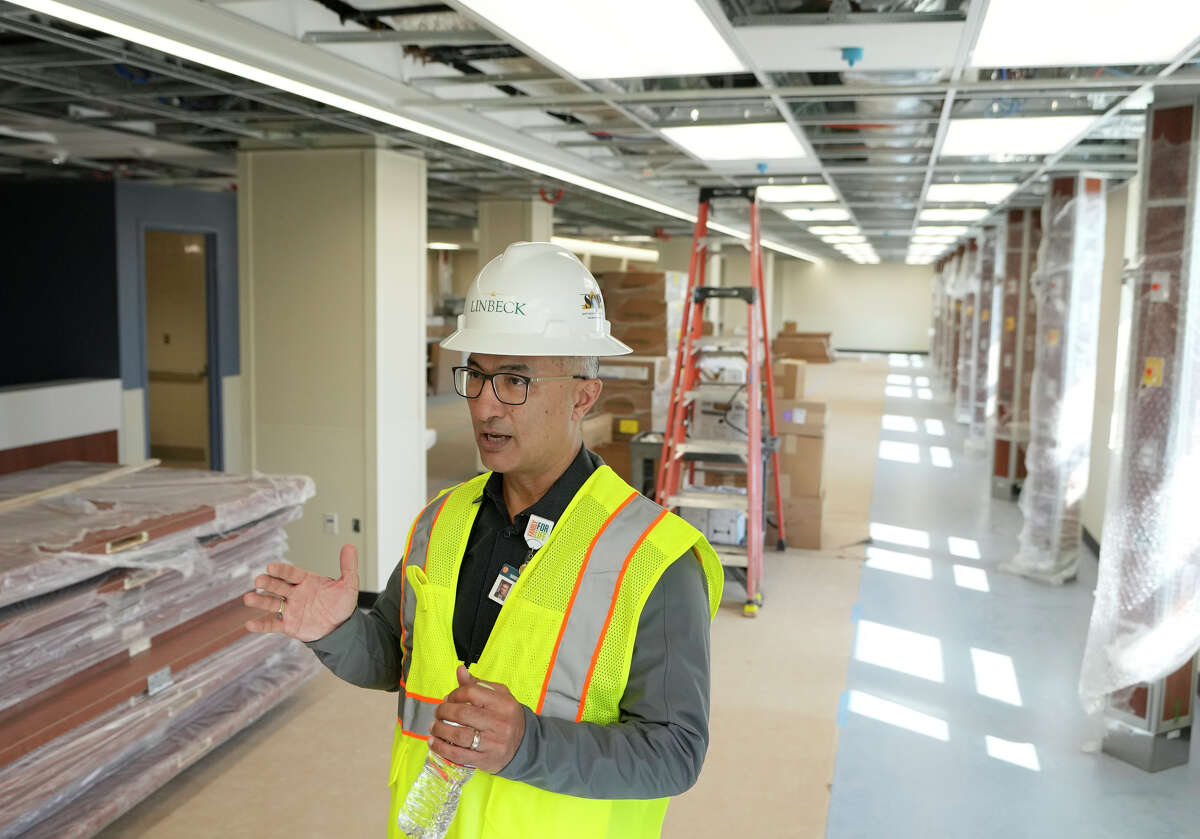 Dr. Esmaeil Porsa, president and CEO for Harris Health System, talks during a tour of the recovery area for endoscopy services shown under construction at Harris Health System’s Quentin Mease facilityWednesday,  Oct. 5, 2022, in Houston.