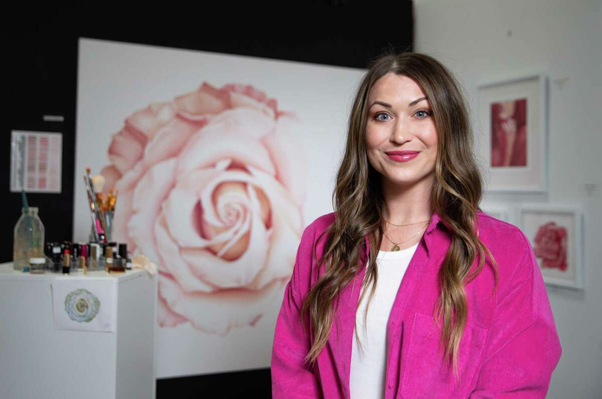 Houston-based artist Katherine Mason uses donated lipstick to create realistic paintings to honor those whose lives have been affected by breast cancer. 