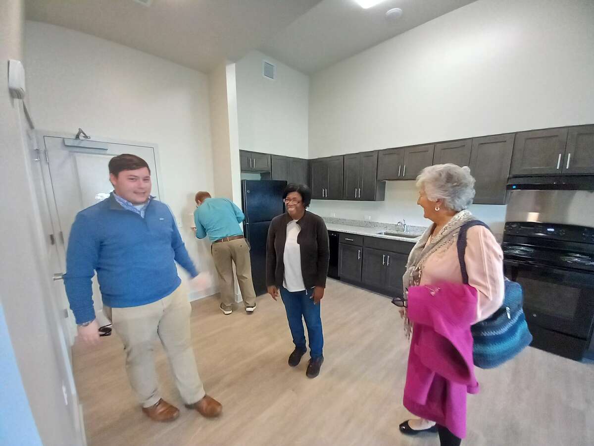 Pennrose's Riverfront, a new apartment building at 100 Franklin St., Torrington, opened to the public Thursday with a ribbon-cutting, tours and a reception. From left, Torrington Republican Town Committee Chairman Chris Beyus, Board of Public Safety member Darlene Battle and City Councilwoman Ann Ruwet check out one of the new apartments. 