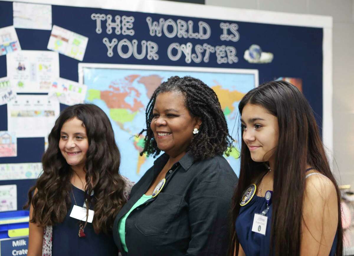 Annette Gordon-Reed, center, poses for a photo with sixth graders to attend the school name in her honor, Thursday, Oct. 6, 2022. Gordon-Reed, a Conroe High School graduate, won the 2009 Pulitzer Prize in History, and was the first African American student to attend a Conroe ISD school in the mid-‘60s.
