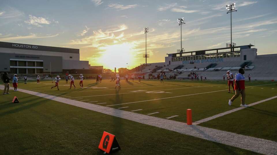 HOUSTON, TX OCT 6: Madisons Dolphins players warm up during the District 11-4A Division I high school football game between the Madison Dolphins and Waltrip Rams at Delmar Stadium in Houston, Texas.