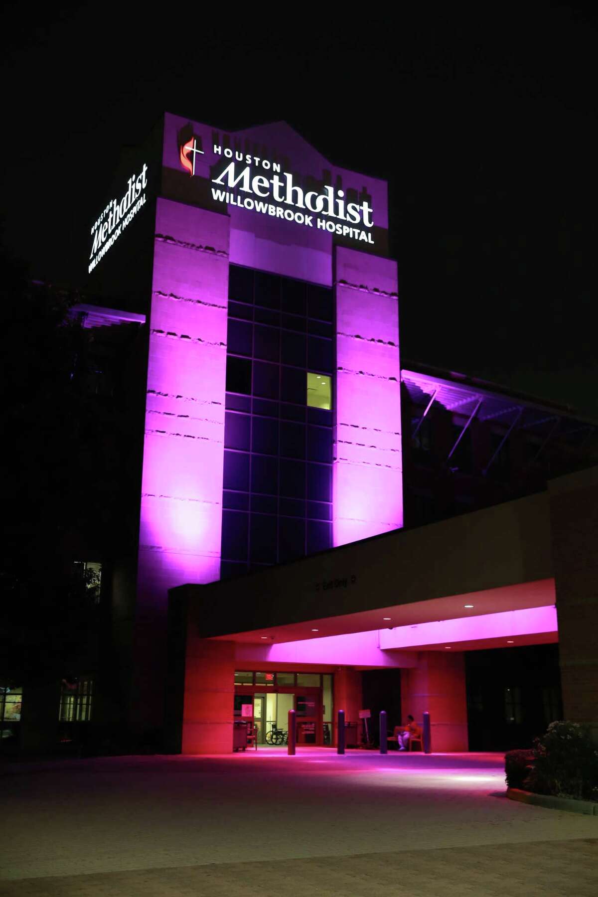 Houston Methodist Willowbrook Hospital lights the Women and Children's Pavilion pink in honor of Breast Cancer Awareness Month.
