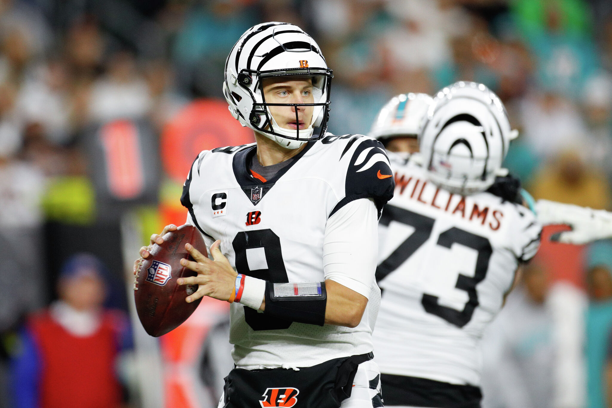 CINCINNATI, OH - SEPTEMBER 29: Cincinnati Bengals quarterback Joe Burrow  (9) looks to pass during the game against the Miami Dolphins and the  Cincinnati Bengals on September 29, 2022, at Paycor Stadium