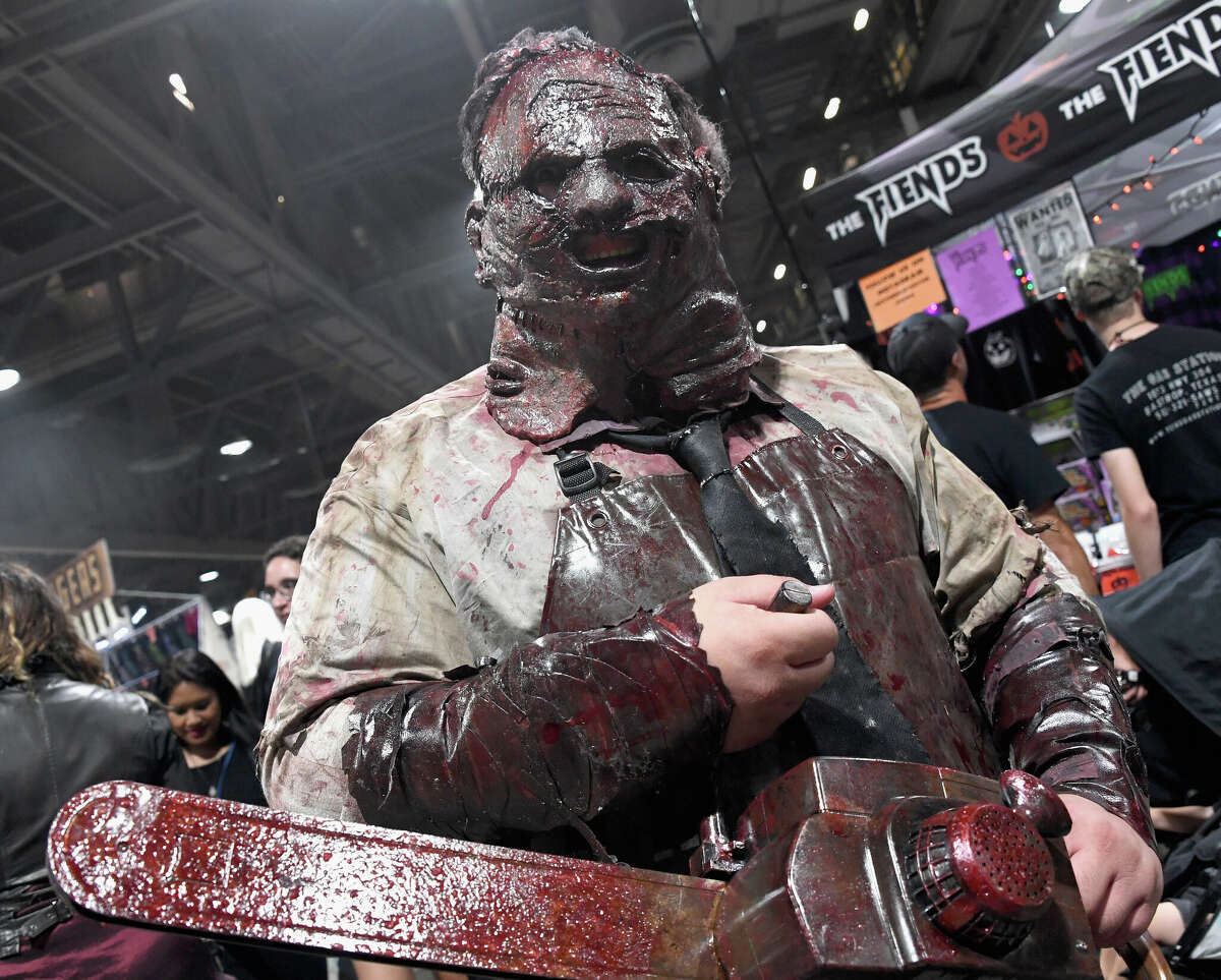 A Horror cosplayer dressed as Leatherface from Texas Chainsaw Massacre attends Midsummer Scream: Halloween And Horror Convention held at Long Beach Convention & Entertainment Center on July 29, 2022 in Long Beach, California.