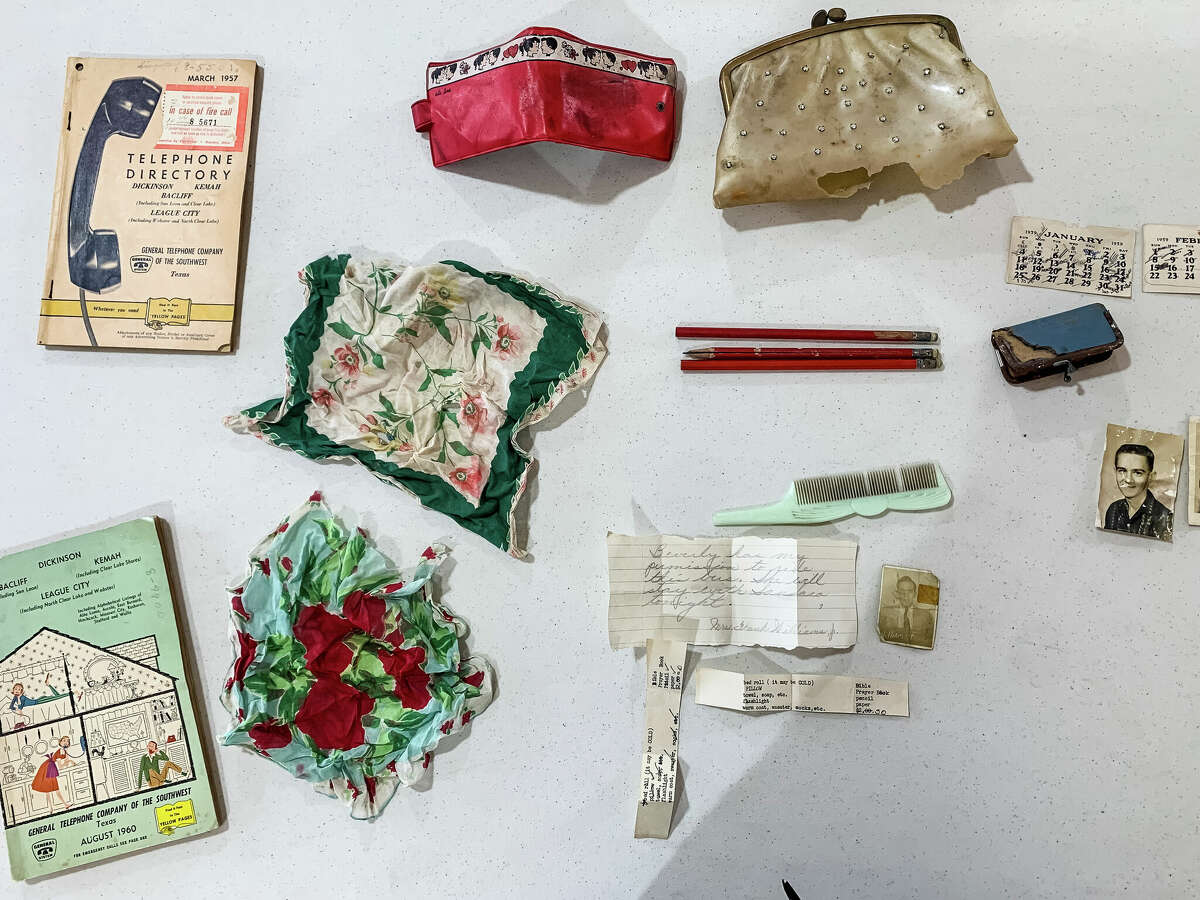 The belongings inside the purse show the life of a teenage girl in the 1950s.