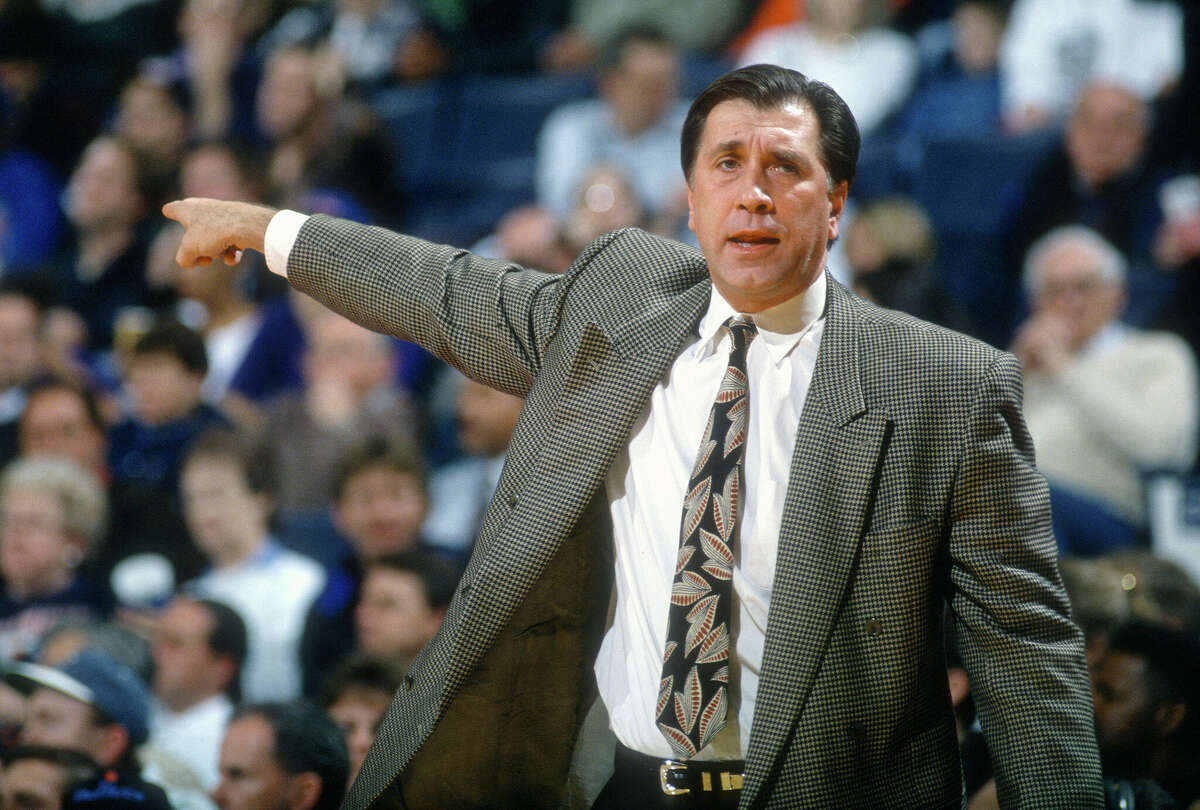 Head coach Rudy Tomjanovich of the Houston Rockets looks on against the Washington Bullets during an NBA basketball game circa 1994.