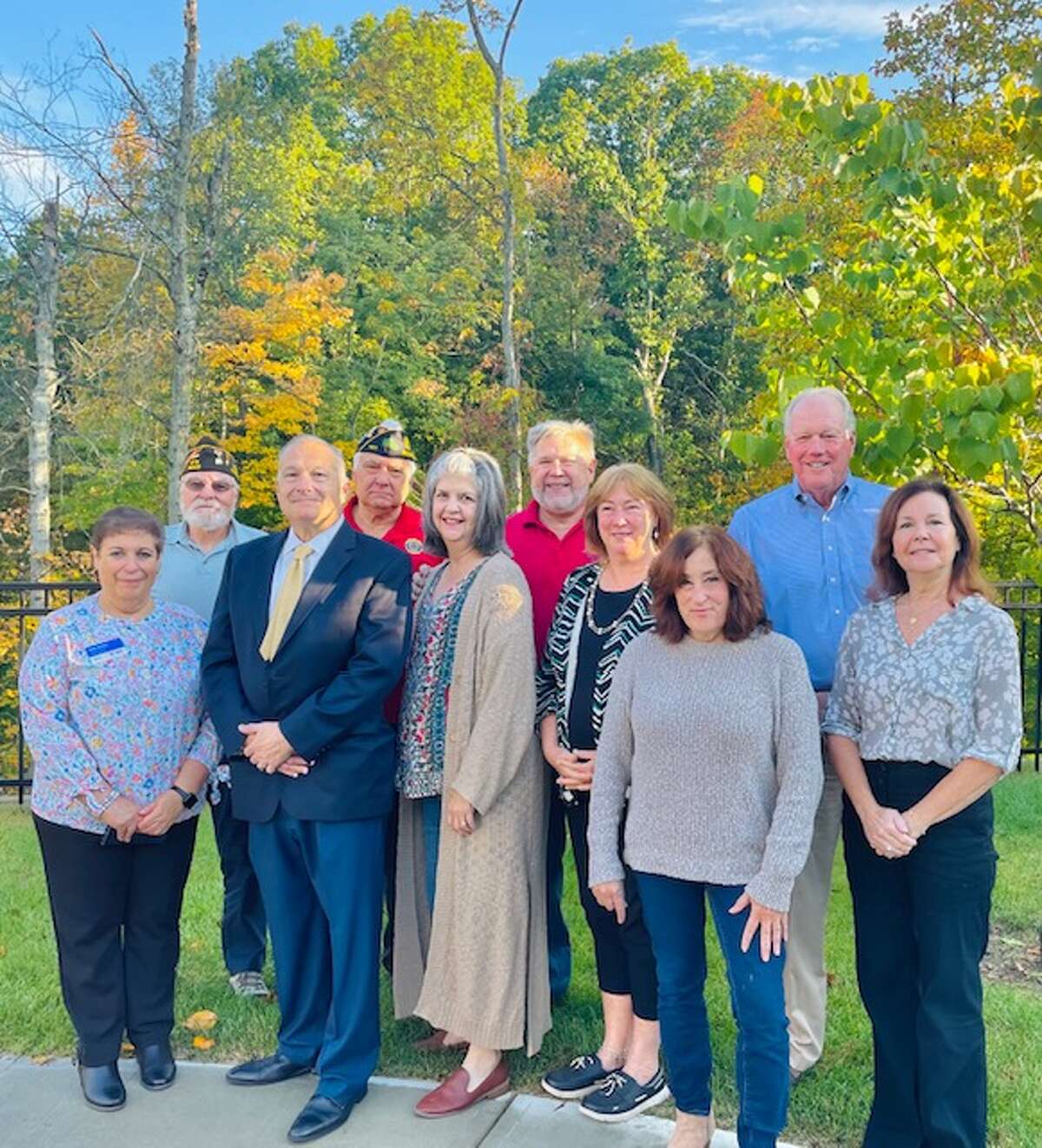 Representatives from Trumbull's veterans, Rotary and police, from left: Beth Stoller, Graham Bisset, Police Chief Michael Lombardo, Ernie Foito, Sue Stonaha, Preston Merritt, Holly Sutton-Darr, Kathi Eigenrauch, Ray Baldwin, and Mary Beth Thornton 