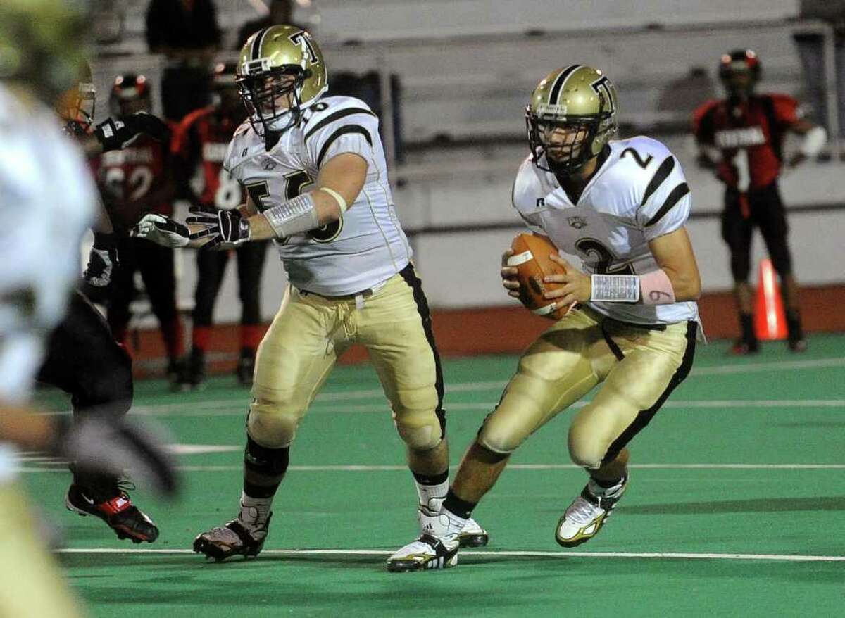 Trumbull's Phil Terio runs the ball during Friday's game at Bridgeport Central High School on October 8, 2010.