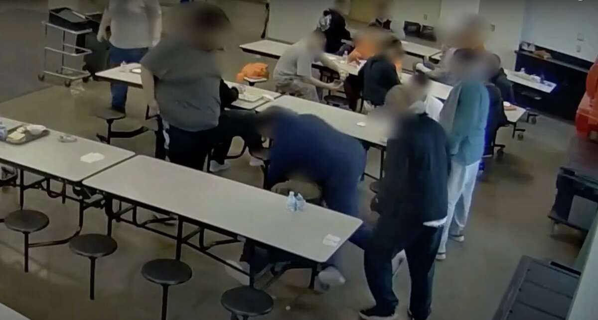 A still image from surveillance video footage of Cornelius Frederick, 16, being restrained at a youth residential facility in Kalamazoo, Michigan in 2020. Frederick died two days later.