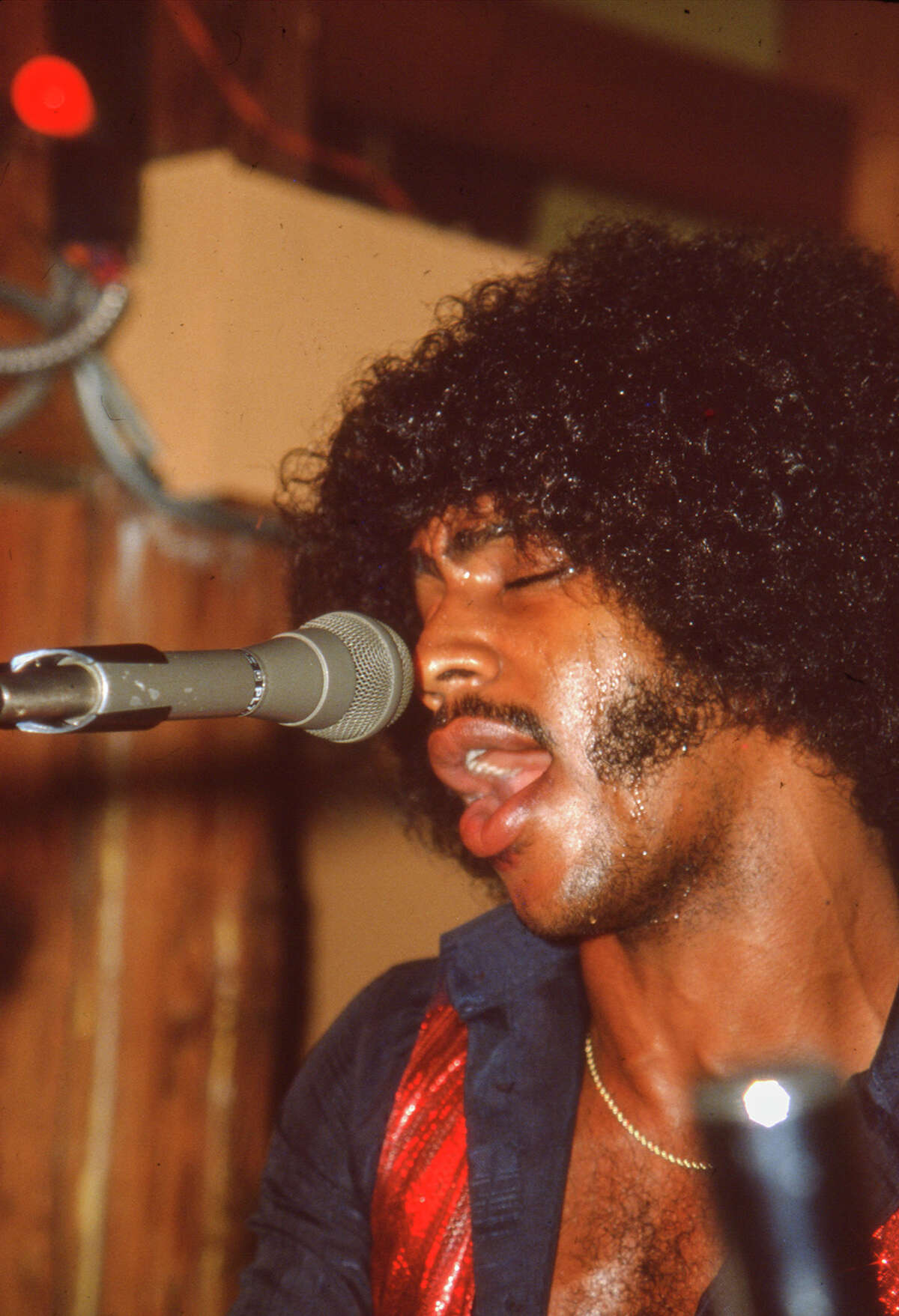 a man is singing Date and place unknown.