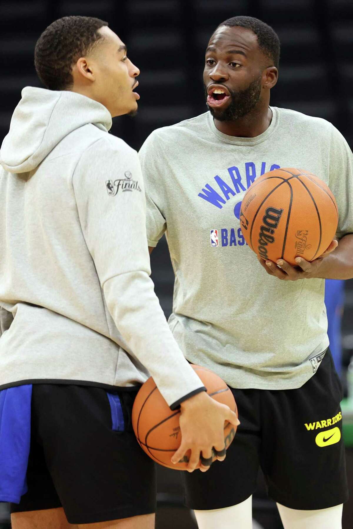 Golden State Warriors’ Draymond Green and Jordan Poole during practice before Game 3 of NBA Finals at TD Garden in Boston, Massachusetts, on Tuesday, June 7, 2022.