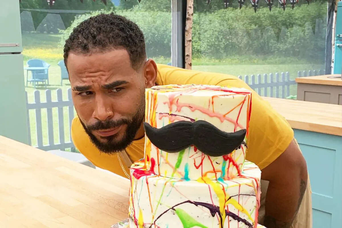 contestants in "The Great British Baking Show" they were challenged to make a four-tier tres leches cake. The mustache was optional.