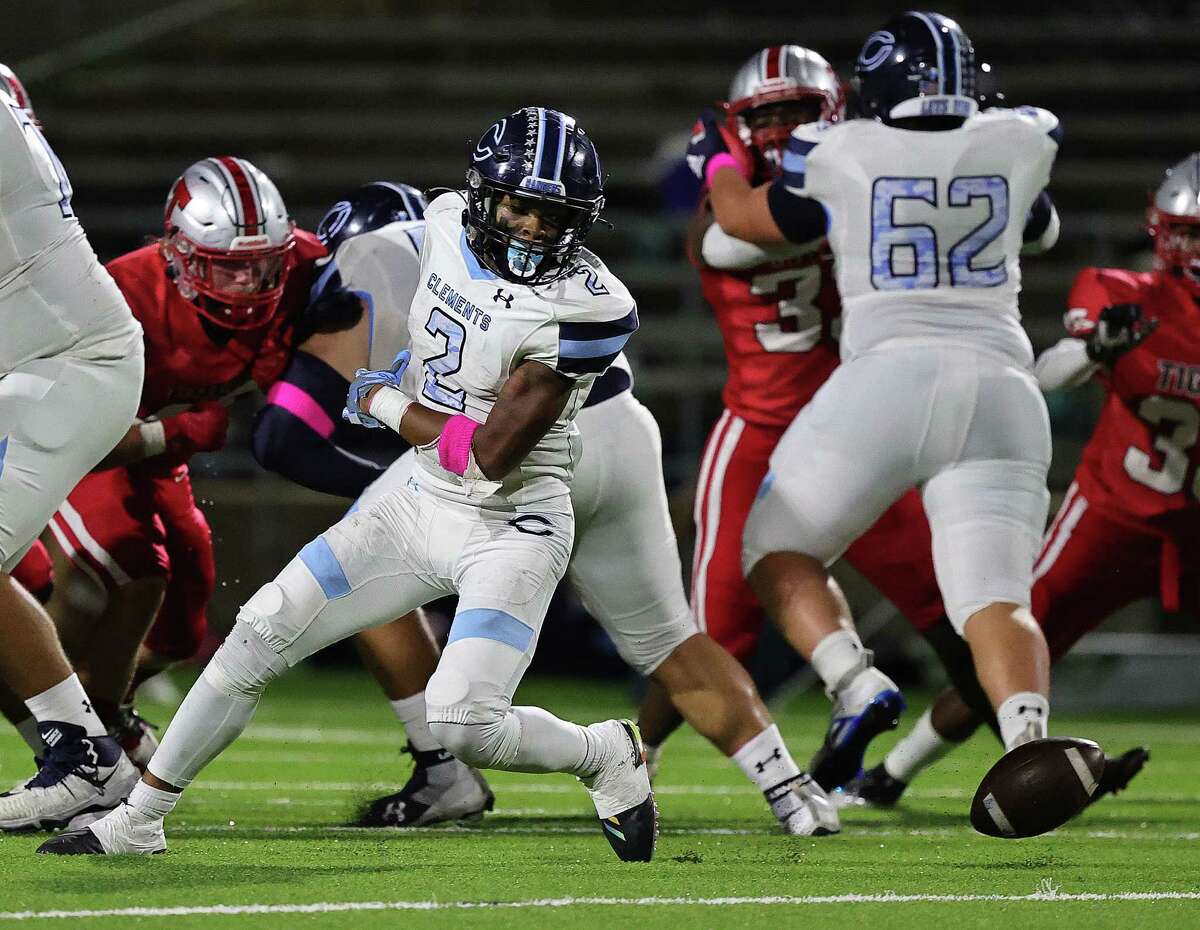 SUGAR LAND, TX -OCTOBER 7: Clements Rangers John Lewis (2) fumblers the ball during a District 20-6A high school football game between the Clements Rangers and the Travis TigersOctober 6, 2022 at Rhodes Stadium in Katy, Texas. (Photo by Bob Levey/Contributor)