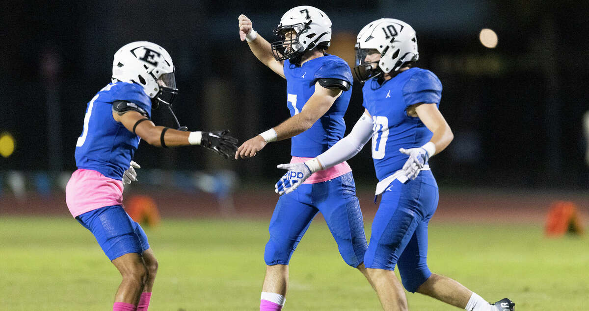 Episcopal Knights Jackson Chavis (3), Ty Blevins (10) and Brayden Crow (7) celebrates a defensive play against the Saint Johns Mavericks the first half of a SPC 4A football game at Simmons Field in Bellaire, TX.