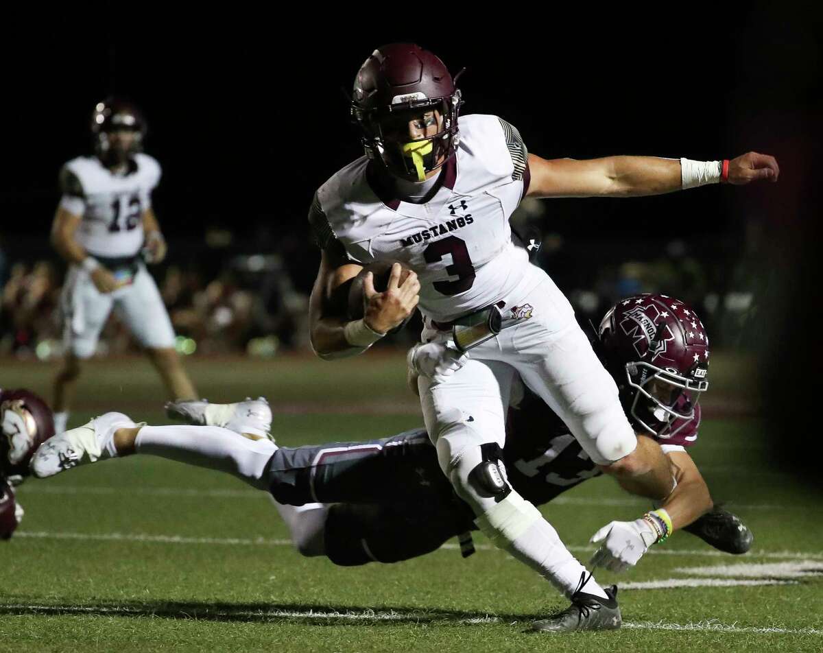 Magnolia West running back Kai Aroca-Disdier (3) is tackled in the third quarter of a District 10-5A (Div. I) high school football game at Bulldog Stadium, Friday, Oct. 7, 2022, in Magnolia.