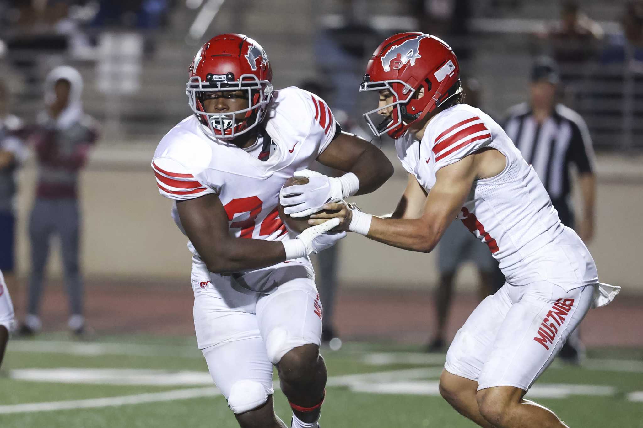 HS FOOTBALL: Cougars rev up running game, hike record to 5-0