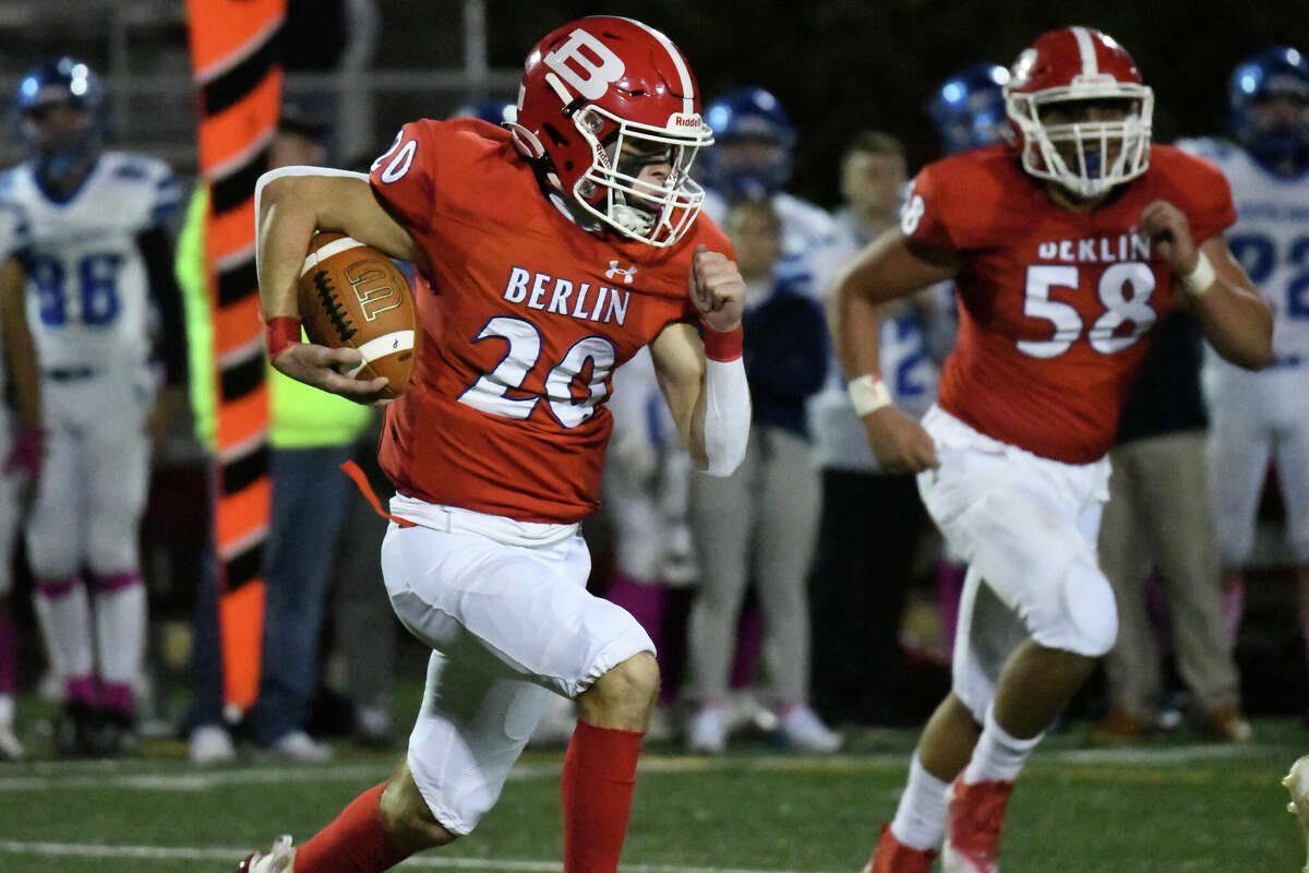 Berlin's Kyle Melville runs with the ball during a football game between Berlin and Bristol Eastern at Sage Park, Berlin on Friday, Oct. 7, 2022.