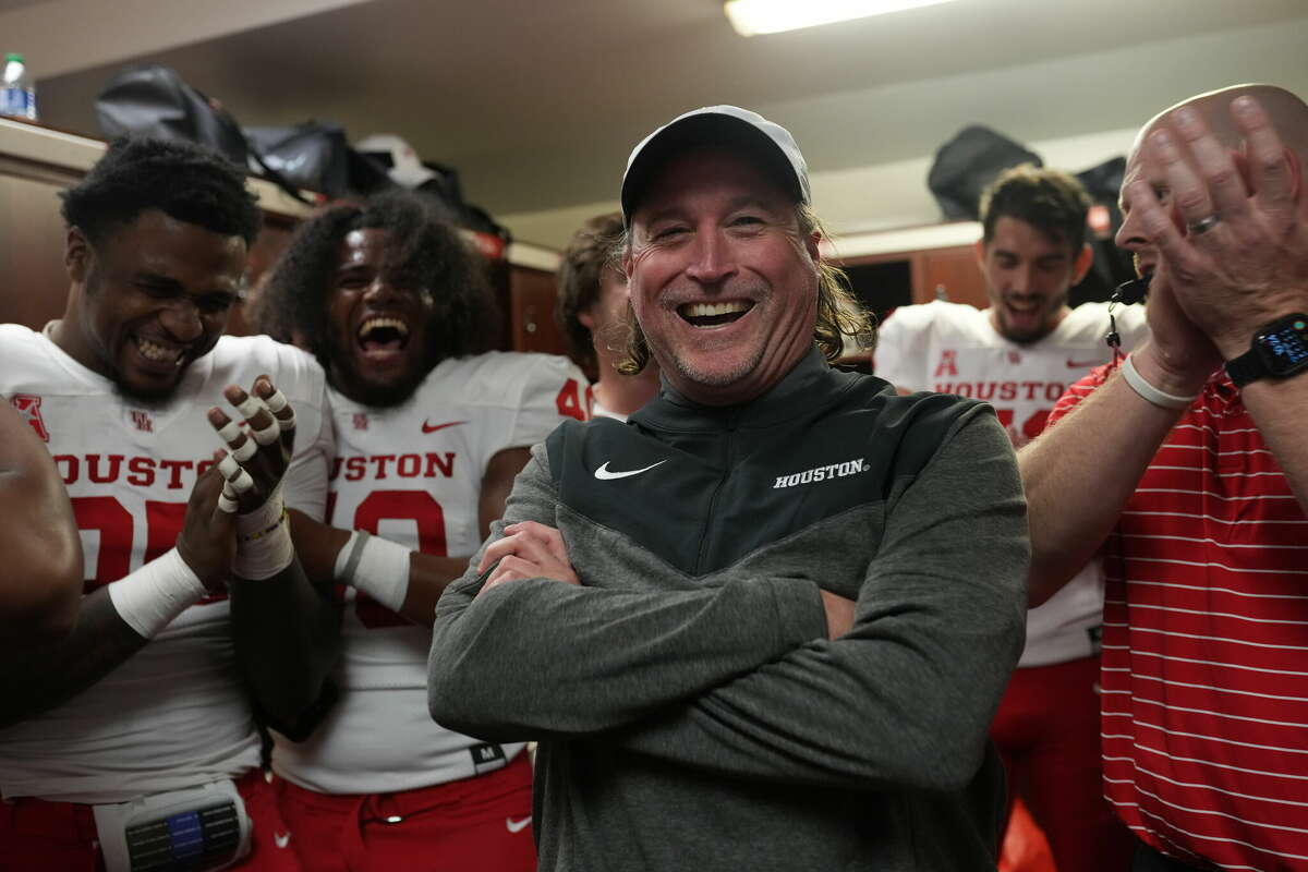 It was a joyous locker-room scene for coach Dana Holgorsen and the Cougars after they rallied from a 19-point deficit during the fourth quarter to beat Memphis on Friday.