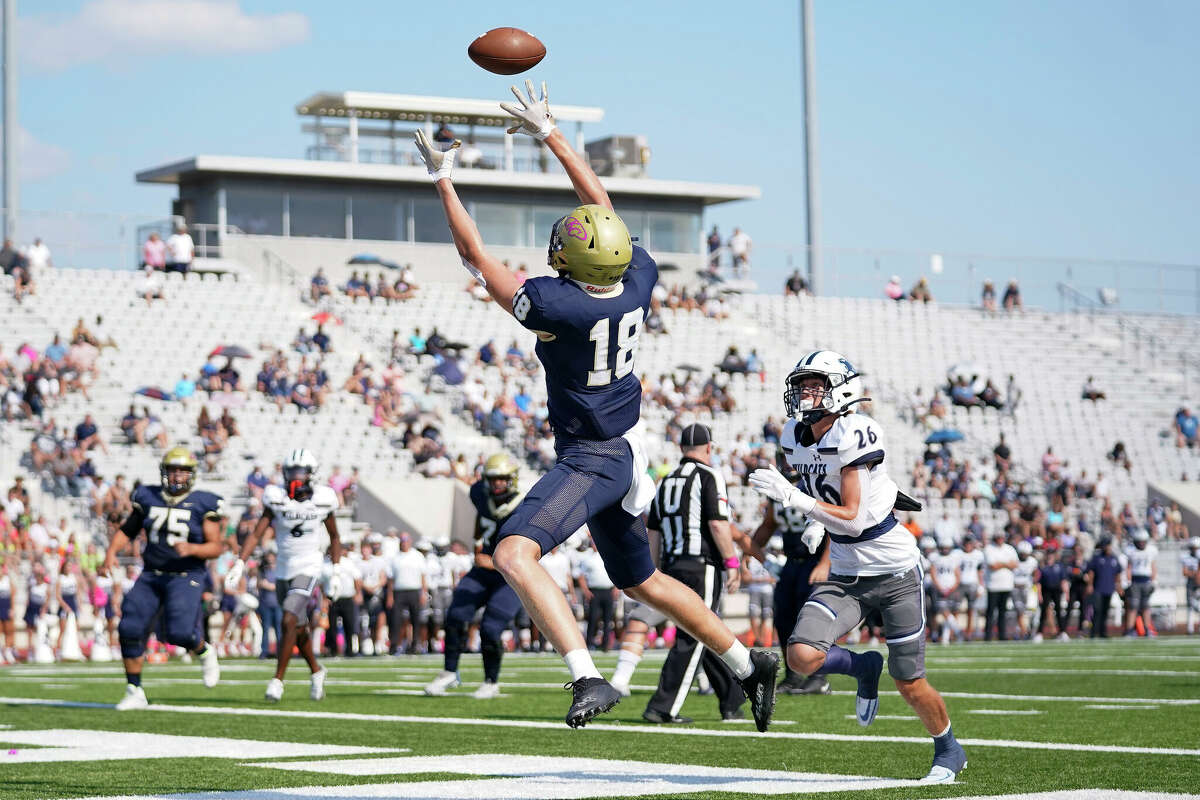 Klein Collins wide receiver Ty Stamey (18) catches a pass in the end zone for a touchdown during the first half of a high school football game against Tomball Memorial, Saturday, Oct. 8, 2022, in Spring.
