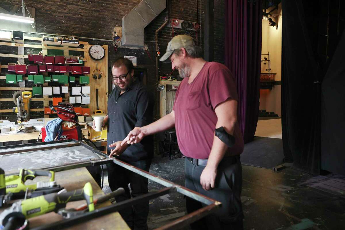 Magik Theatre’s Prop Master Lucian Hernandez, left, and Technical Director Pat Smith work on props for the upcoming production of “Eddie & Vinnie,” Wednesday, Sept. 14, 2022. City officials are recommending grants for 136 artists and 46 arts nonprofits, funded with San Antonio's federal COVID-19 aid. The arts took a hit during the pandemic, so the city infused about $5 million to help keep them on their feet and ensure San Antonio doesn't lose its distinctive arts and culture personality. Magik Theater is one of the organizations that could receive an ARPA grant.