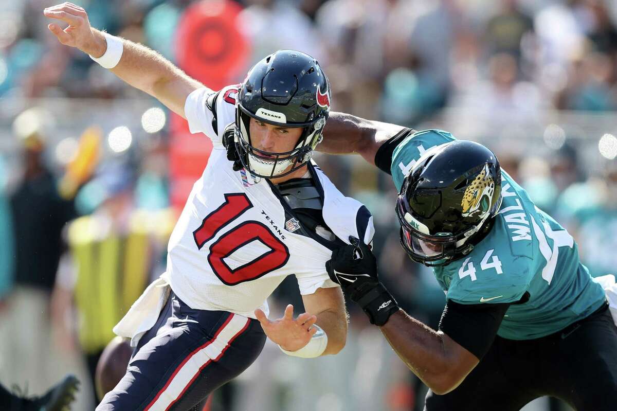 Jaguars defensive end Travon Walker grabbing Texans quarterback Davis Mills and throwing him to the ground after the whistle was a pivotal point in Houston's game-winning drive.