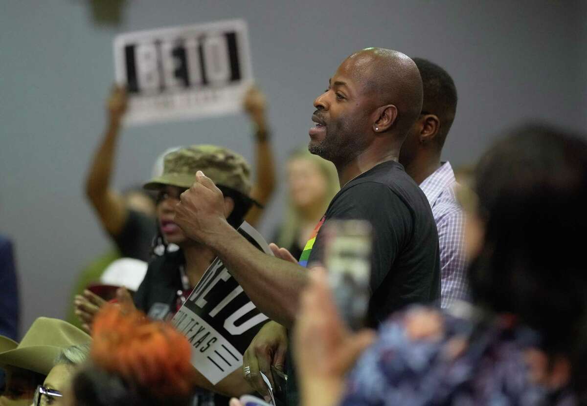 The crowd cheers for Texas gubernatorial candidate Beto O'Rourke at Black Texans for Beto town hall Sunday, Oct. 9, 2022, at Tidwell Community Center in Houston.