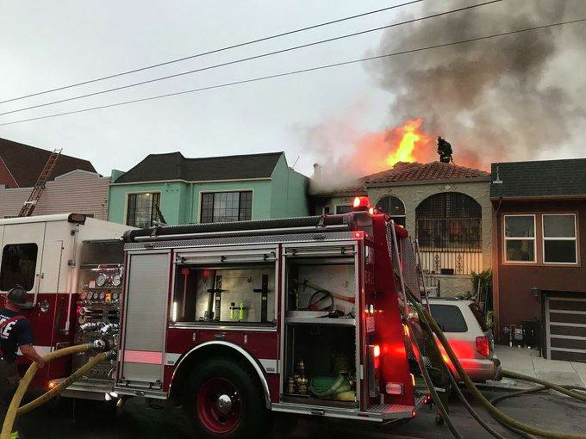 Fifteen people were displaced when a two alarm fire ripped through three homes in the Silver Terrace neighborhood.