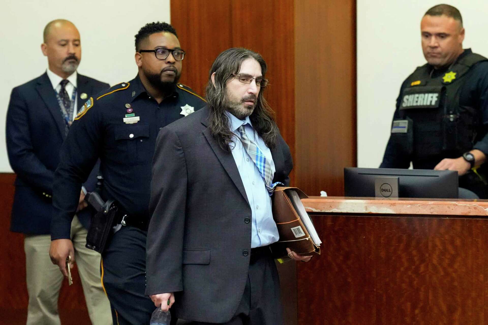 Man accused of killing sheriff's deputy will represent himself