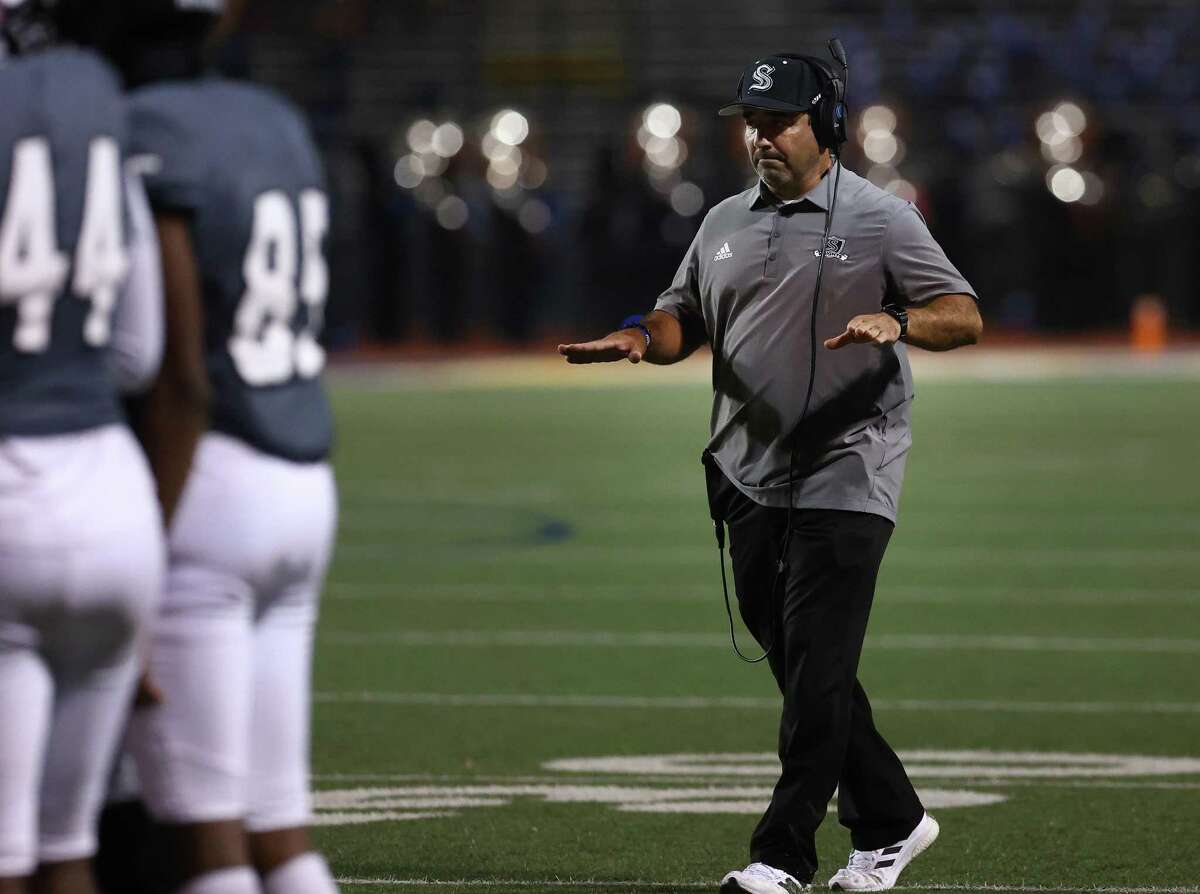 Steele head coach David Saenz, right, as seen during the game against New Braunfels at Lenhoff Stadium on Friday.
