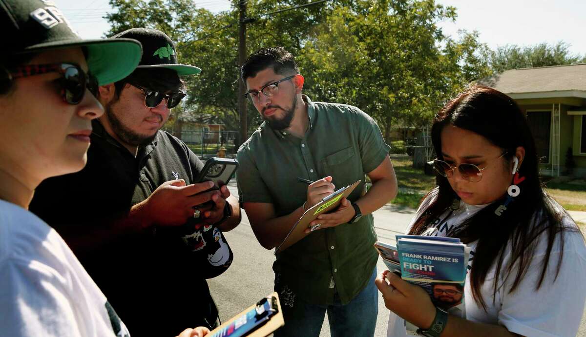 Frank Ramirez,center, plans strategy with Lina Silvs,RJ Requejo and Nicolette Ardiente,right on Harding st. at on Saturday, Oct. 1. 2022 on Harding St.