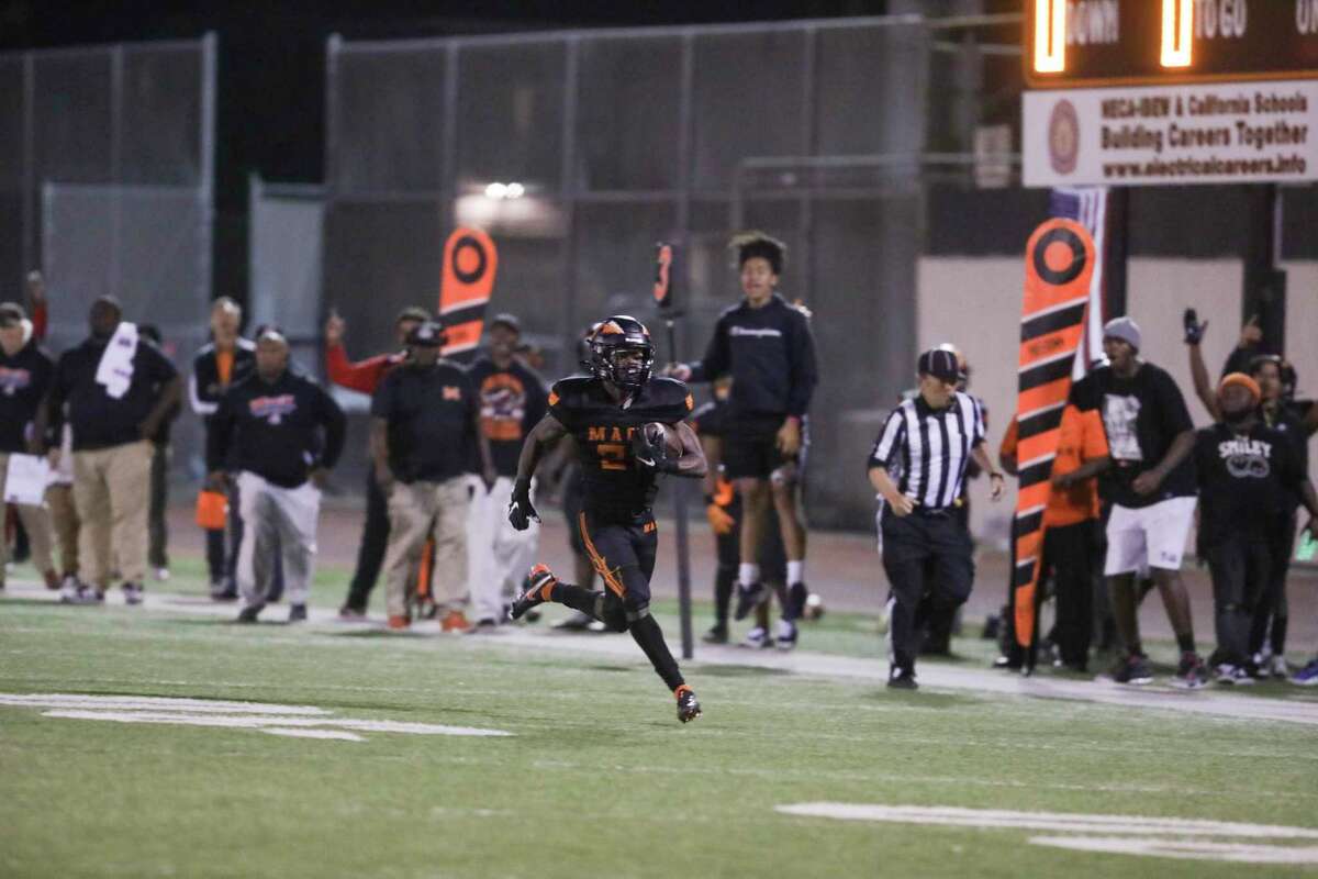 McClymonds running back Javian Thomas, here running last month, had 280 yards and four TDs in Mack’s 45-42 defeat of San Ramon Valley.