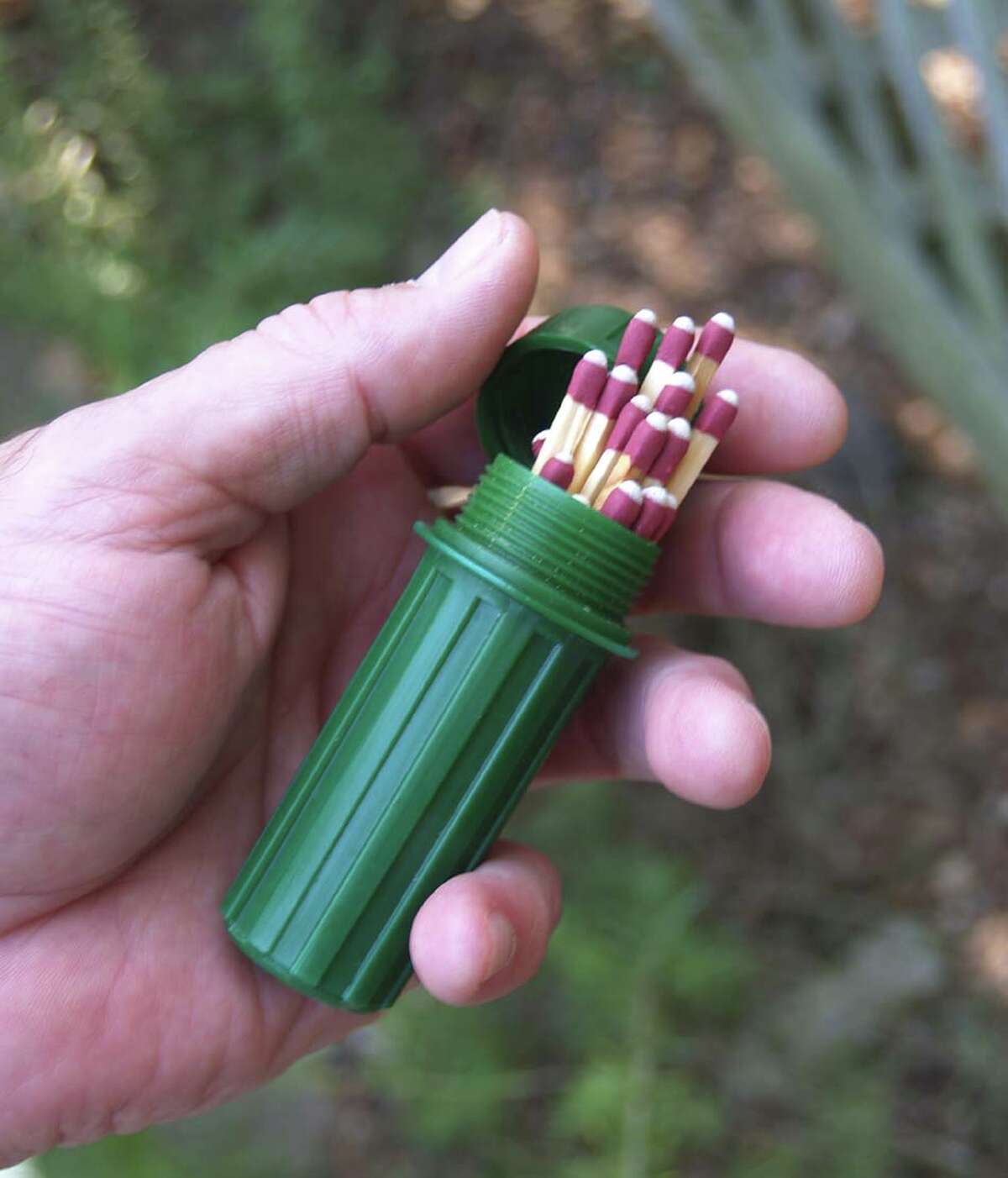 A waterproof match holder is one of many fire starters available for campers.