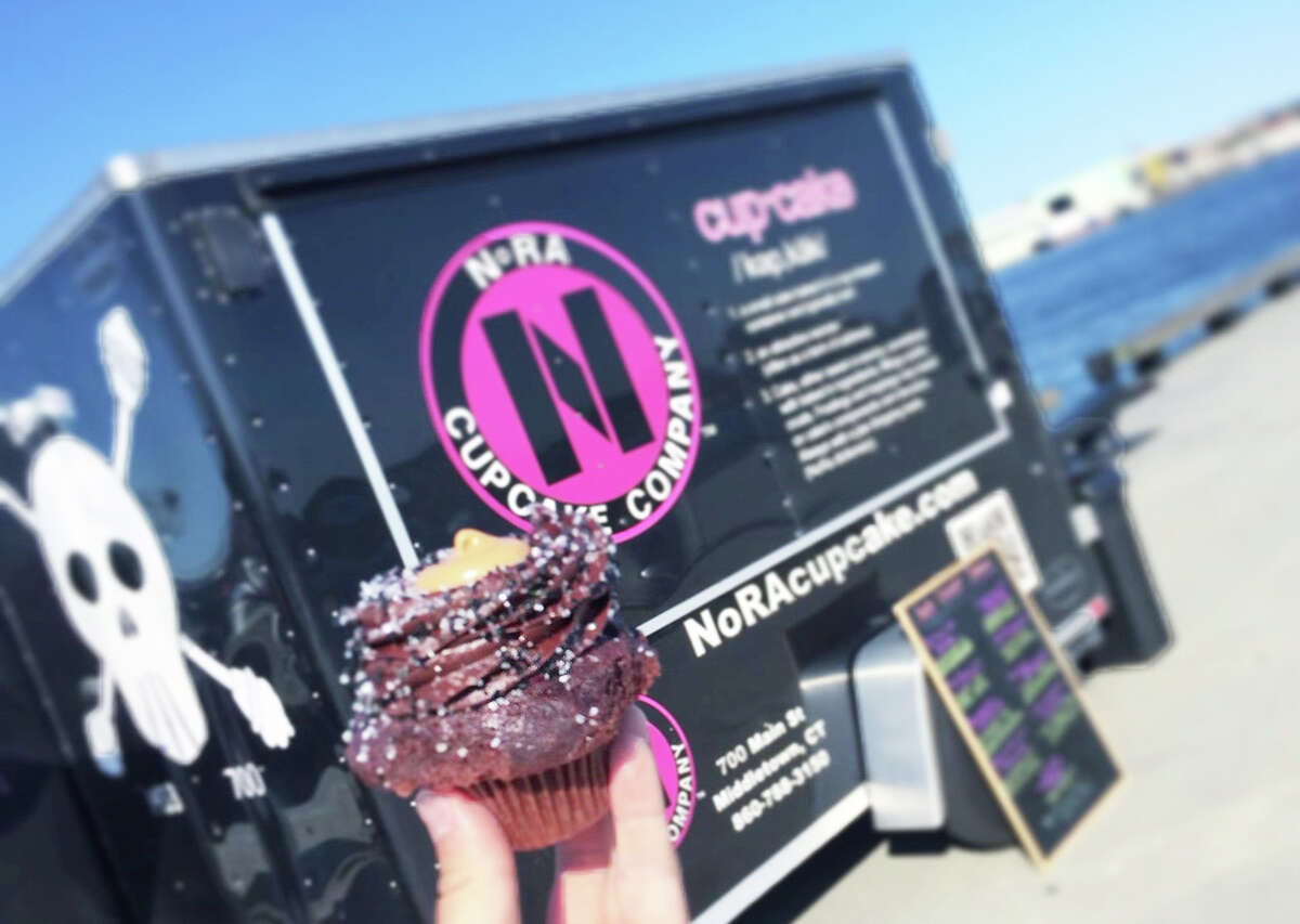 NoRA Cupcake Co. owner Carrie Carella said new state regulations that require a food truck vendor only pay a permit fee in the town where their vehicle is registered  will save her Lil' NoRA Cupcake Truck thousands of dollars a year. Middletown is one of 13 health districts in the state to so far adopt the program.