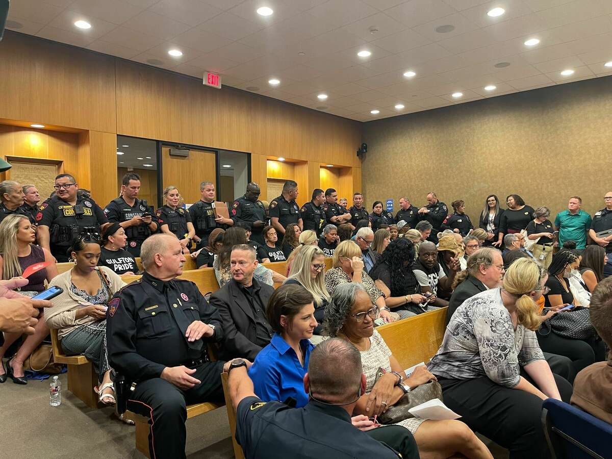 Law enforcement officers with Harris County constables offices lined the hallways and courtroom as Harris County Commissioners Court was set to start on Tuesday morning. 