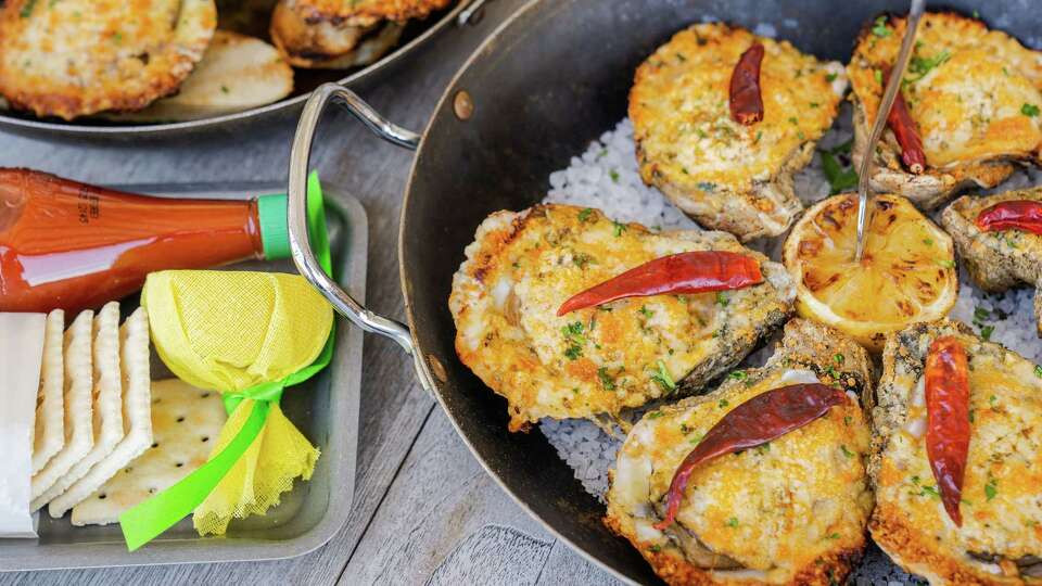 Hot-Blooded Oysters at Pier 6 Seafood & Oyster House in San Leon are grilled with a topping of garlic, sriracha and habanero butter.