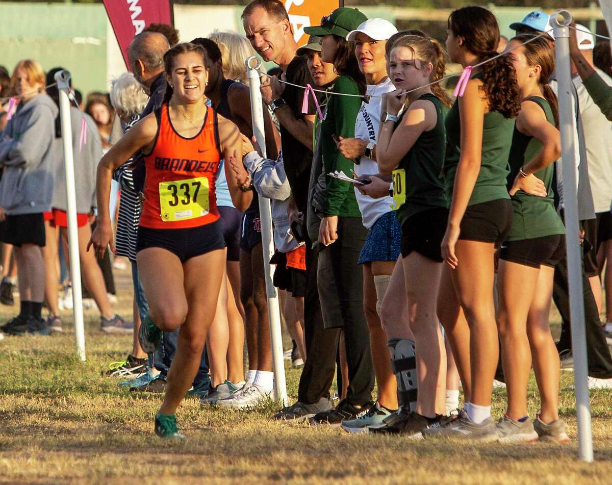 Brandeis’ Mikaela Garza competes Tuesday in the District 28-6A cross country championships at the North East Sports Park. Garza finished first with a time of 18:56.6.
