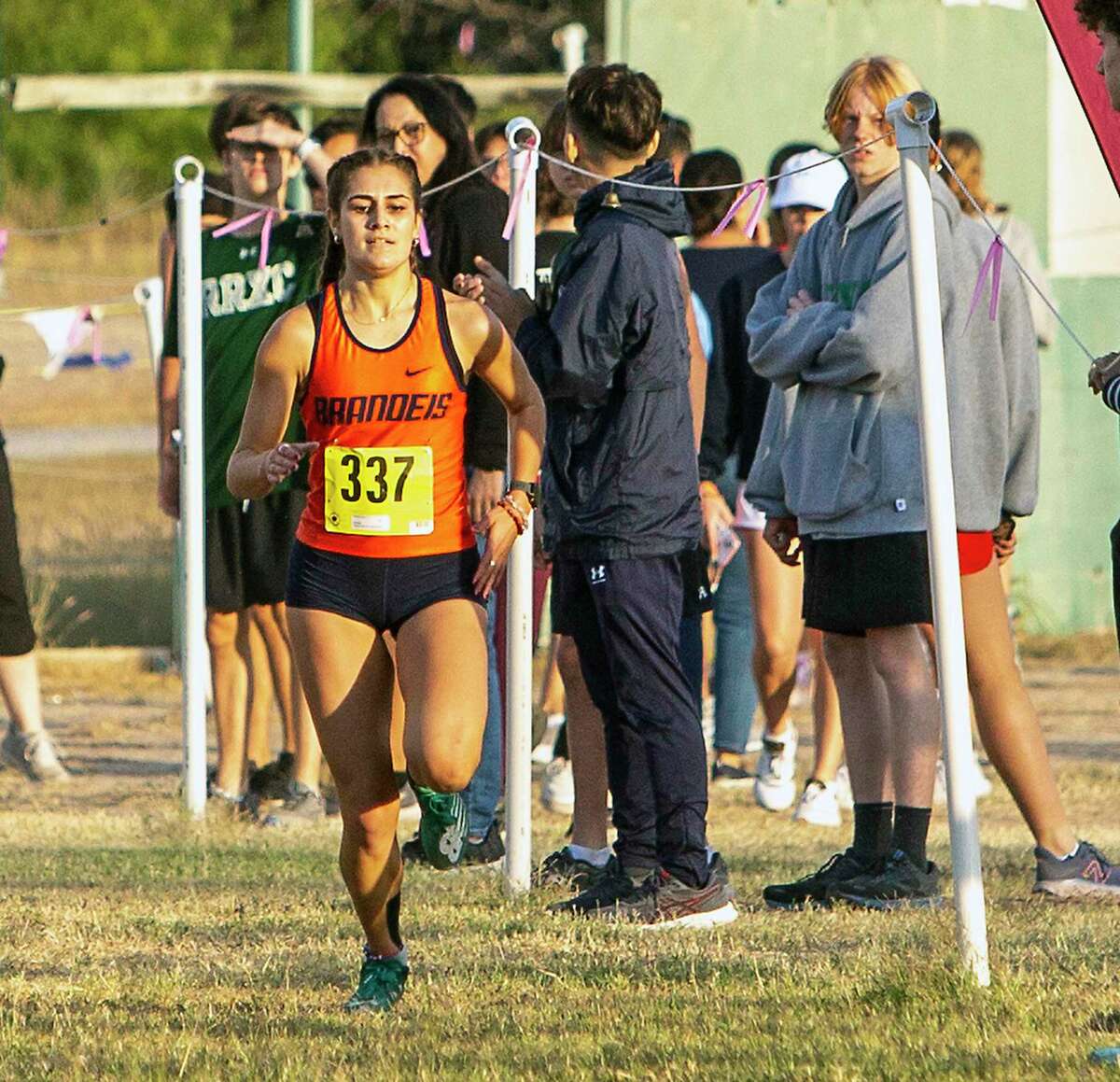 Brandeis’ Mikaela Garza competes Tuesday in the District 28-6A cross country championships at the North East Sports Park. Garza finished first with a time of 18:56.6.