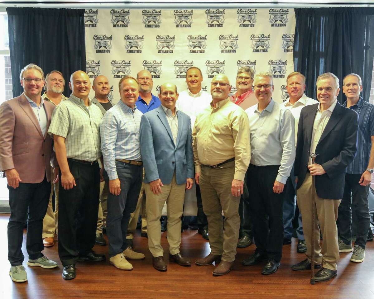 Members of the Clear Lake High School state championship swim teams from 1981 to 1984 inducted into the 2022 Clear Creek ISD Athletic Hall of Honor class.