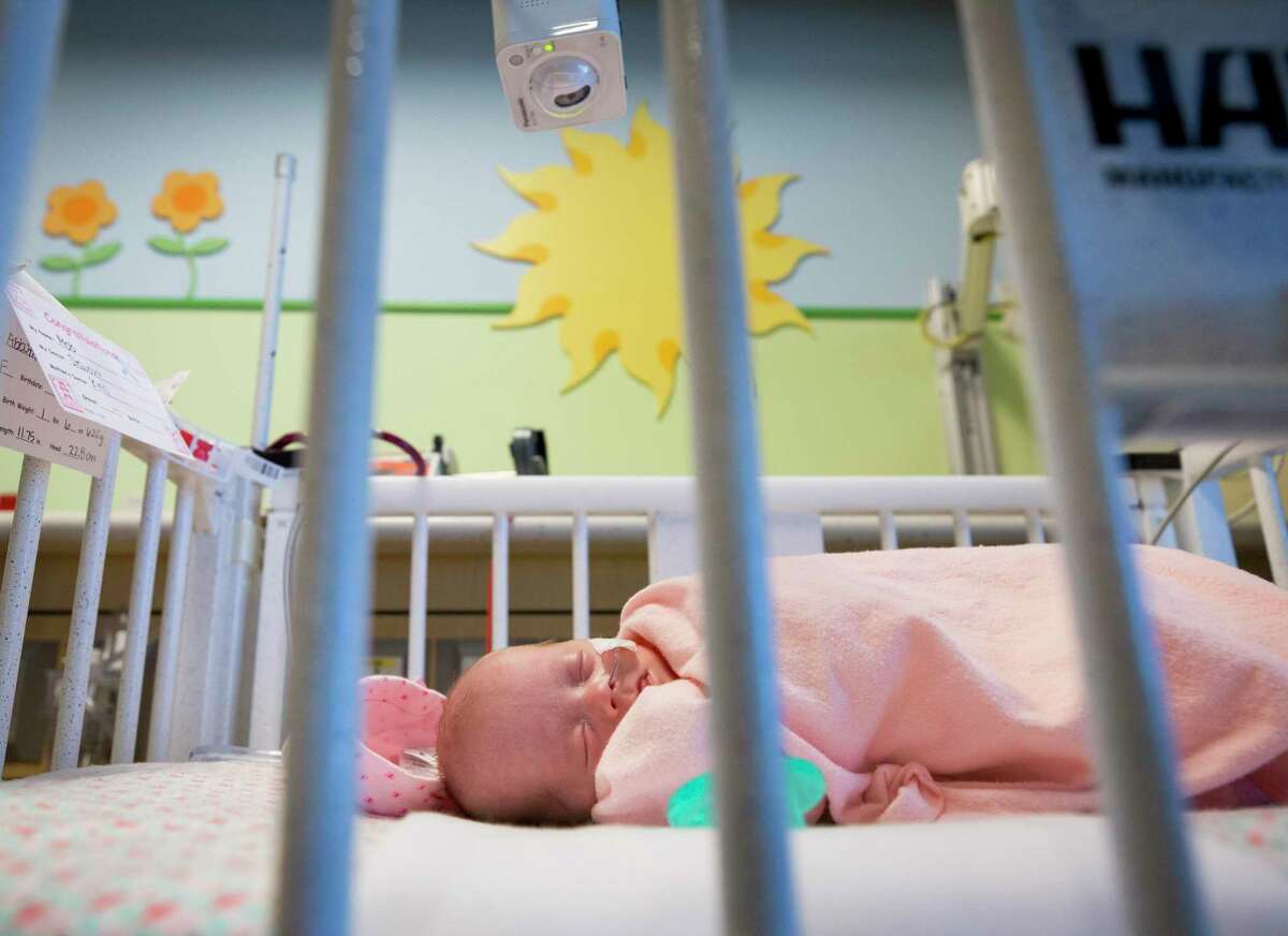 A three-month-old sleeps in her crib inside the neo-natal intensive care unit at Memorial Hermann Hospital Tuesday, Oct. 17, 2017, in Houston. ( Godofredo A. Vasquez / Houston Chronicle)