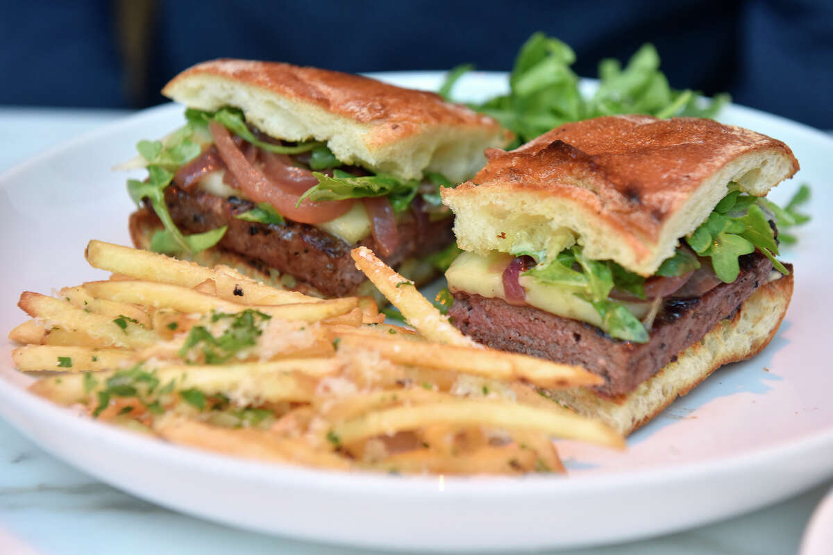 The burger at the Palm Court restaurant, with an order of truffle fries.