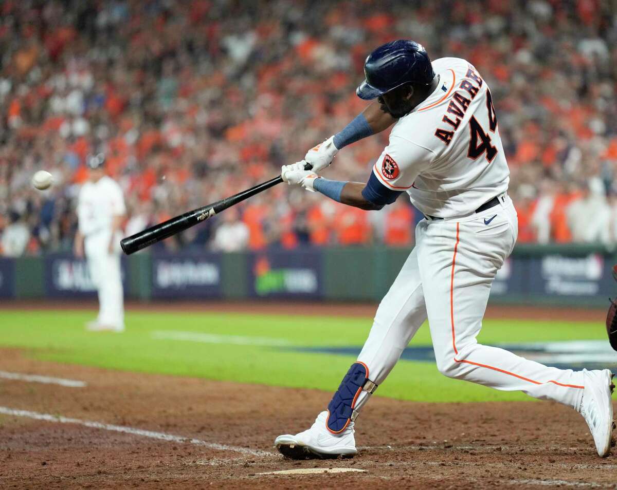 Yordan Alvarez connects on the three-run walk-off homer that gave the Astros an 8-7 victory over the Mariners on Tuesday at Minute Maid Park. 