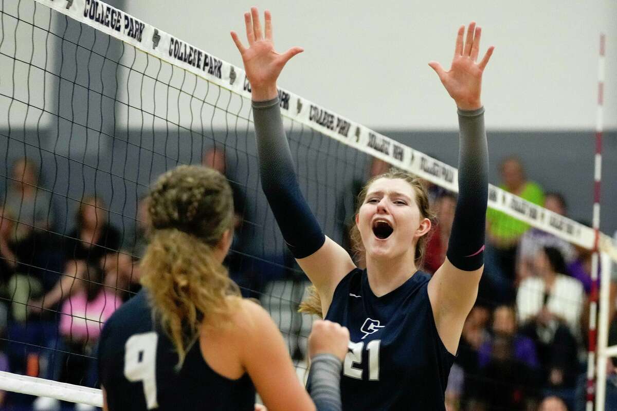 College Park's Lacy Tinnell (21) celebrates a point during a high school volleyball match against Willis, Tuesday, Oct. 11, 2022, in The Woodlands.