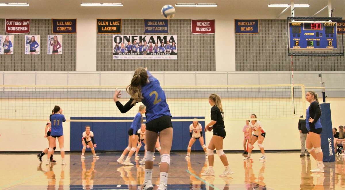 Onekama junior Ashlyn Blackmore (2) watches her serve sail against Benzie Central on Oct. 11 at Onekama High School. 