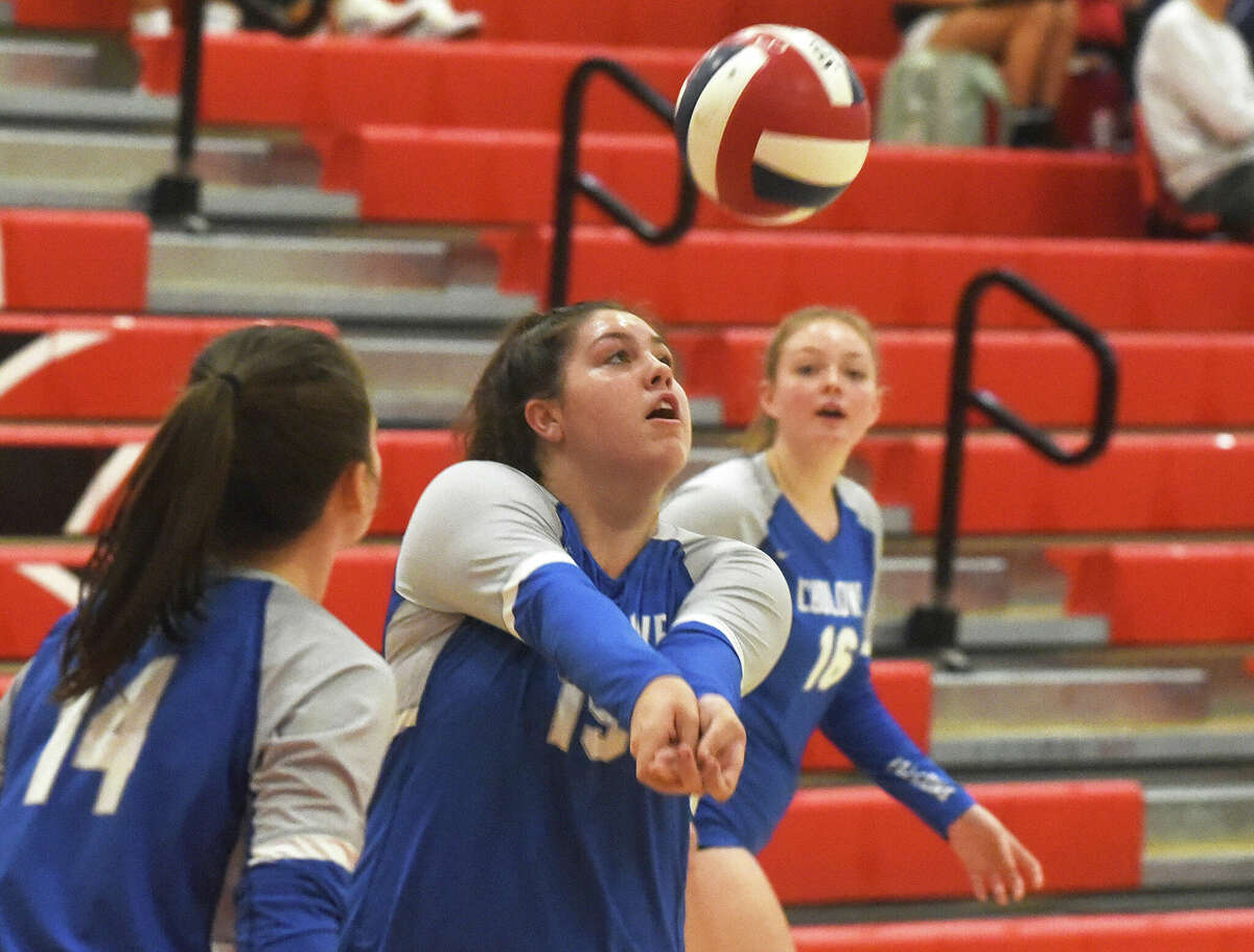 Ludlowe's Madison Roman (19) keeps the ball up during a volleyball match in Greenwich on Tuesday, Sept. 27, 2022.