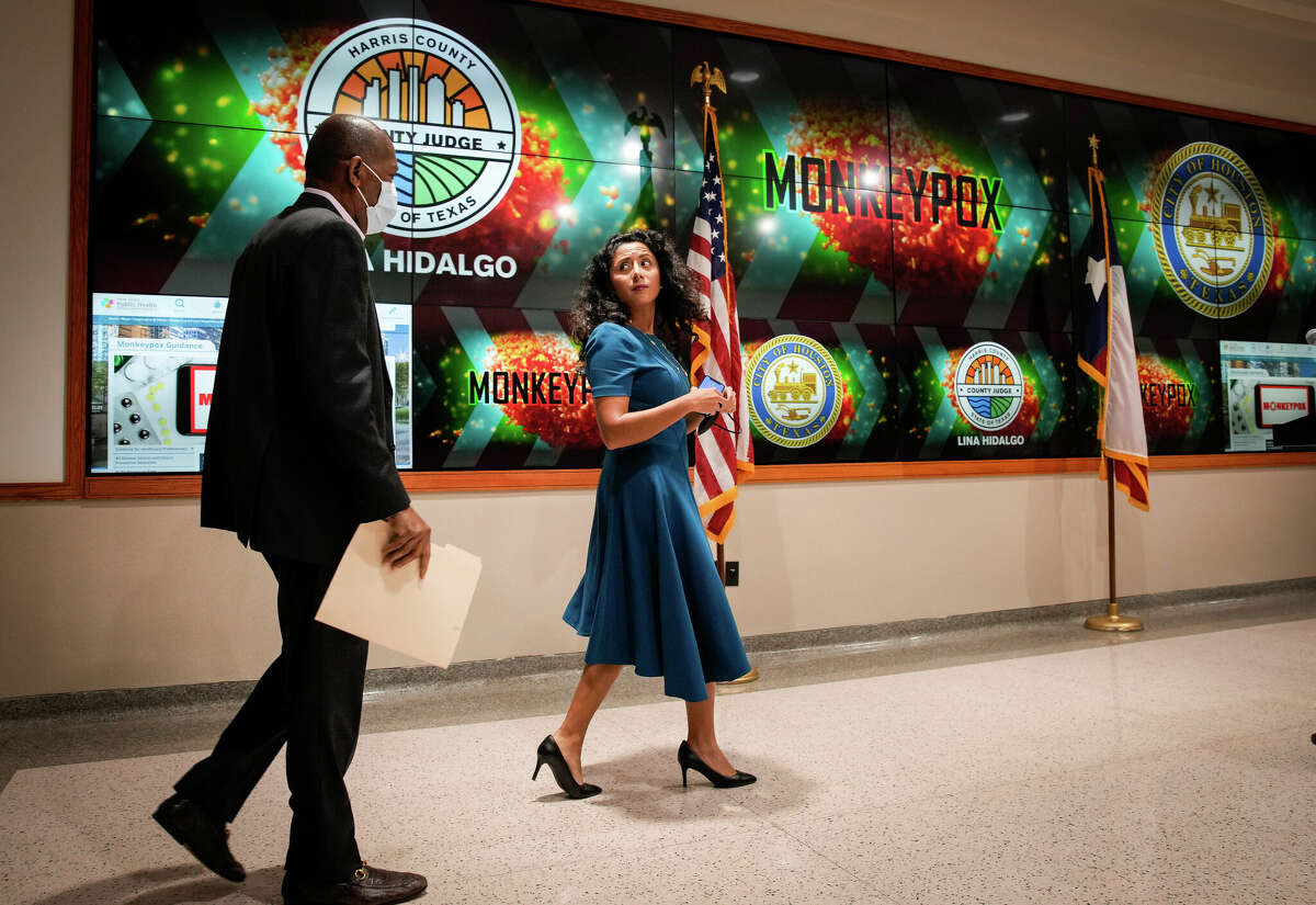 Harris County Judge Lina Hidalgo looks back at Houston Mayor Sylvester Turner before they gave a joint press conference about growing Monkeypox infections Monday, July 25, 2022, at Houston TranStar headquarters in Houston. 