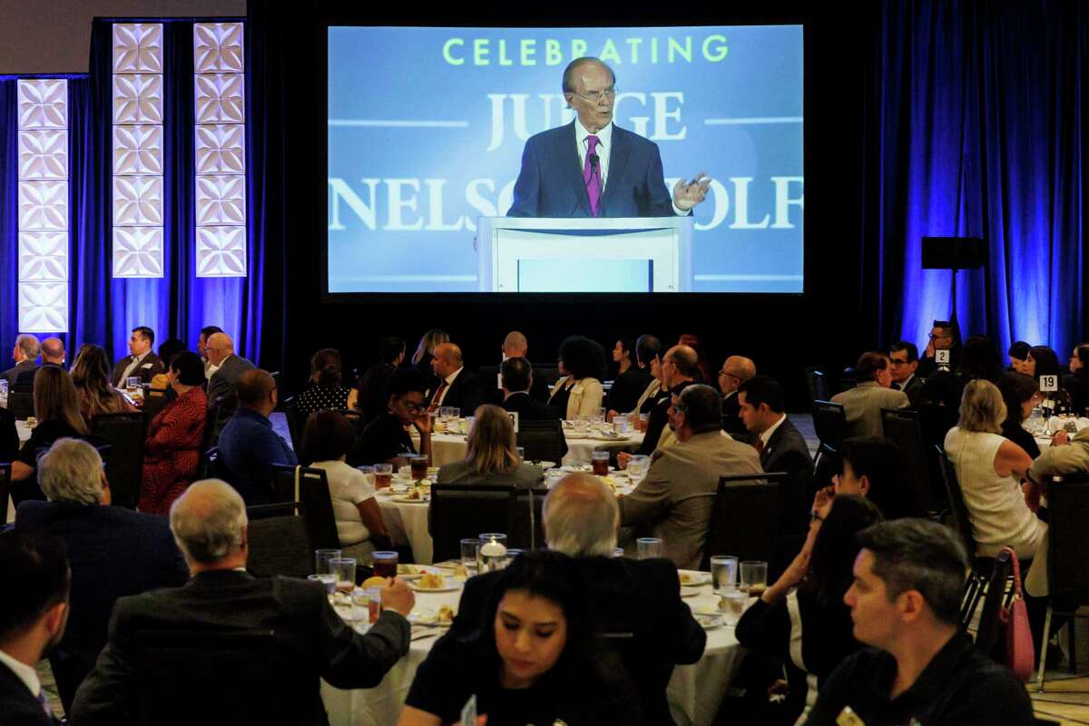 Bexar County Judge Nelson Wolff makes his final State of the County address to a large crowd at the Grand Hyatt in downtown San Antonio on Wednesday.