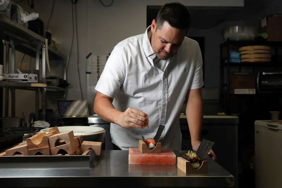 Kyle Itani makes sushi hand rolls at Yonsei Handrolls in Oakland. Itani also runs Itani Ramen and Hopscotch.