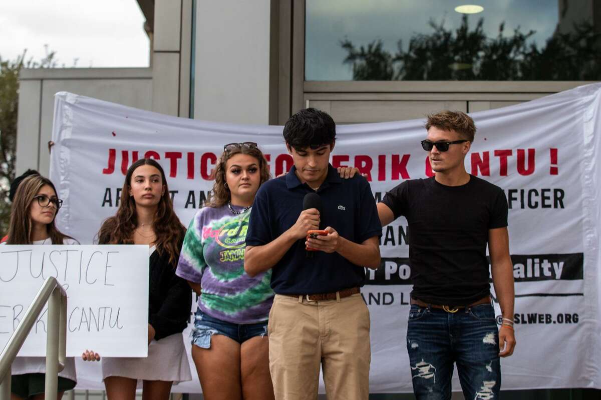George Ramos speaks about his friend Erik Cantu, who was shot by then-San Antonio police officer James Brennand, during a protest on Tuesday outside San Antonio Police headquarters. Brennand, who was fired last week, was arrested Tuesday on two counts of aggravated assault by a peace officer.